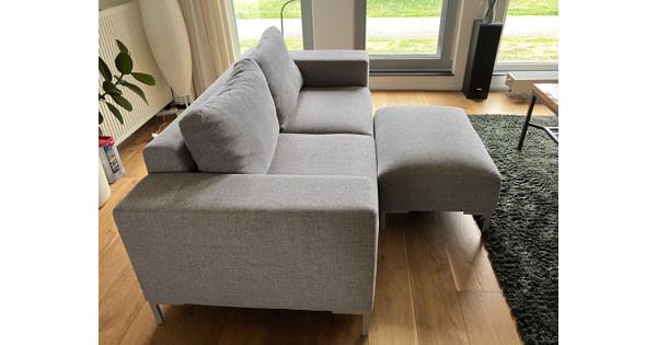 Stoffen 2,5 zitsbank met poef