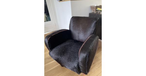 Fauteuil met koeienhuid