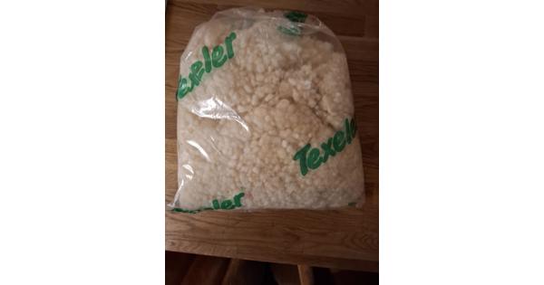 Wol uit Texel als vulling voor kussen of knuffel