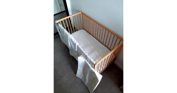 Babybed  verstelbare hoogte.