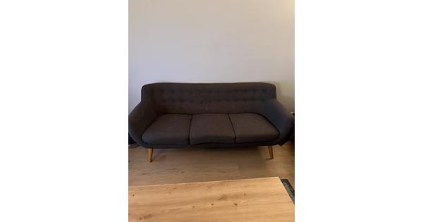 Grijze stoffen driezitter