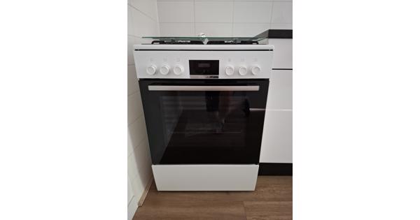 Gasfornuis met elektrische oven in goede staat