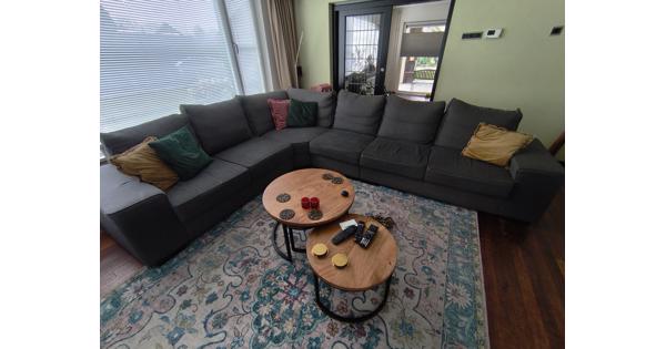 Grote grijze hoekbank