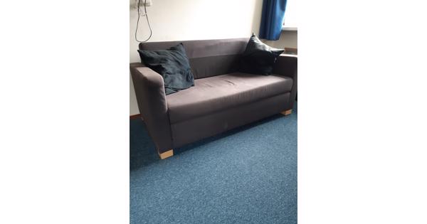 slaapbank en 2 sierkussens