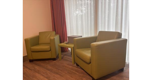 Groene fauteuils