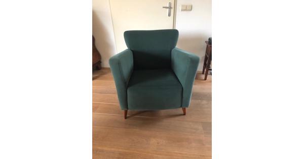 Groene fauteuil van alcantara-stof