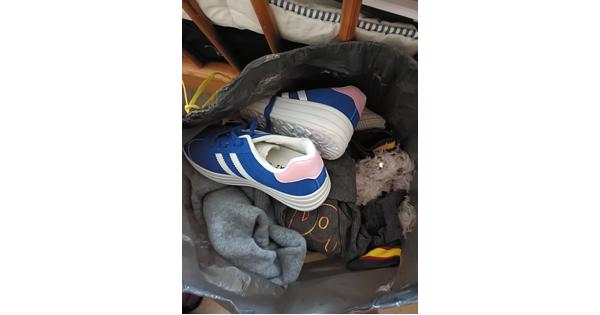 Bag of women's clothing and some shoes