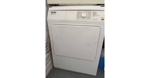 Wasdroger met luchtafvoerslang