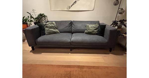 Driezits bank met net nieuwe hoezen