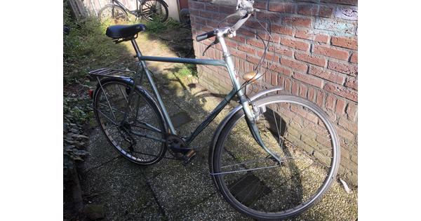 Sportieve herenfiets met werk