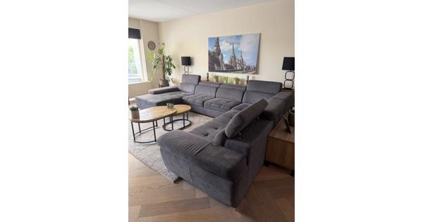 Mooie grote grijze loungebank in u-model