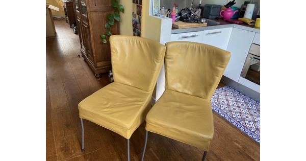 4 gele leren stoelen