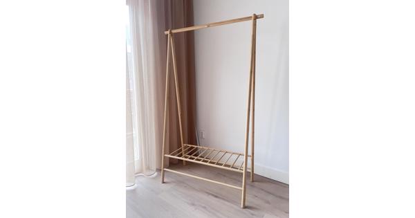 Elegant clothing rack in light bamboo